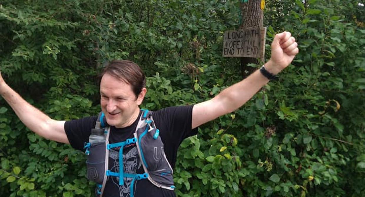 Board member Charlie Gadol celebrates the completion of his Long Path section hike. Photo by Charlie Gadol.