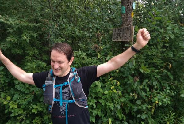 Board member Charlie Gadol celebrates the completion of his Long Path section hike. Photo by Charlie Gadol.