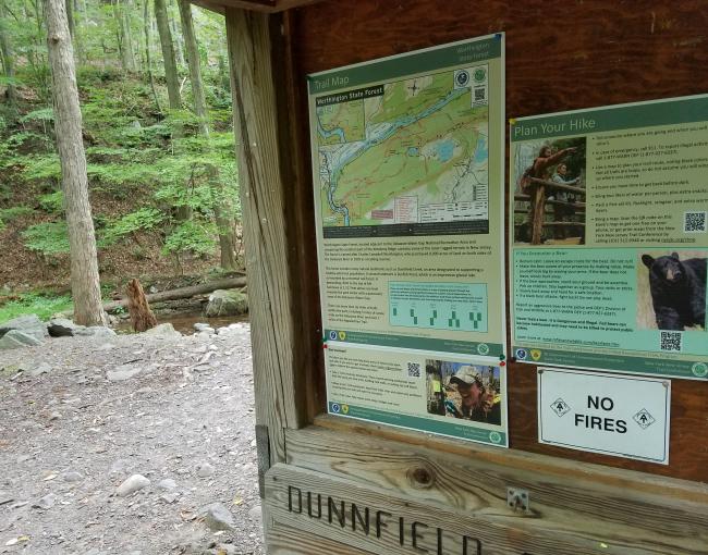 Trailhead kiosk signs at Worthington State Forest.
