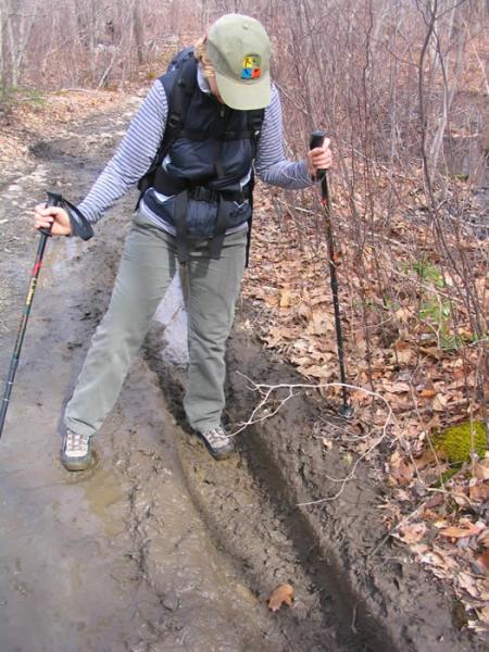 Hiker encounters muddy ATV tracks.